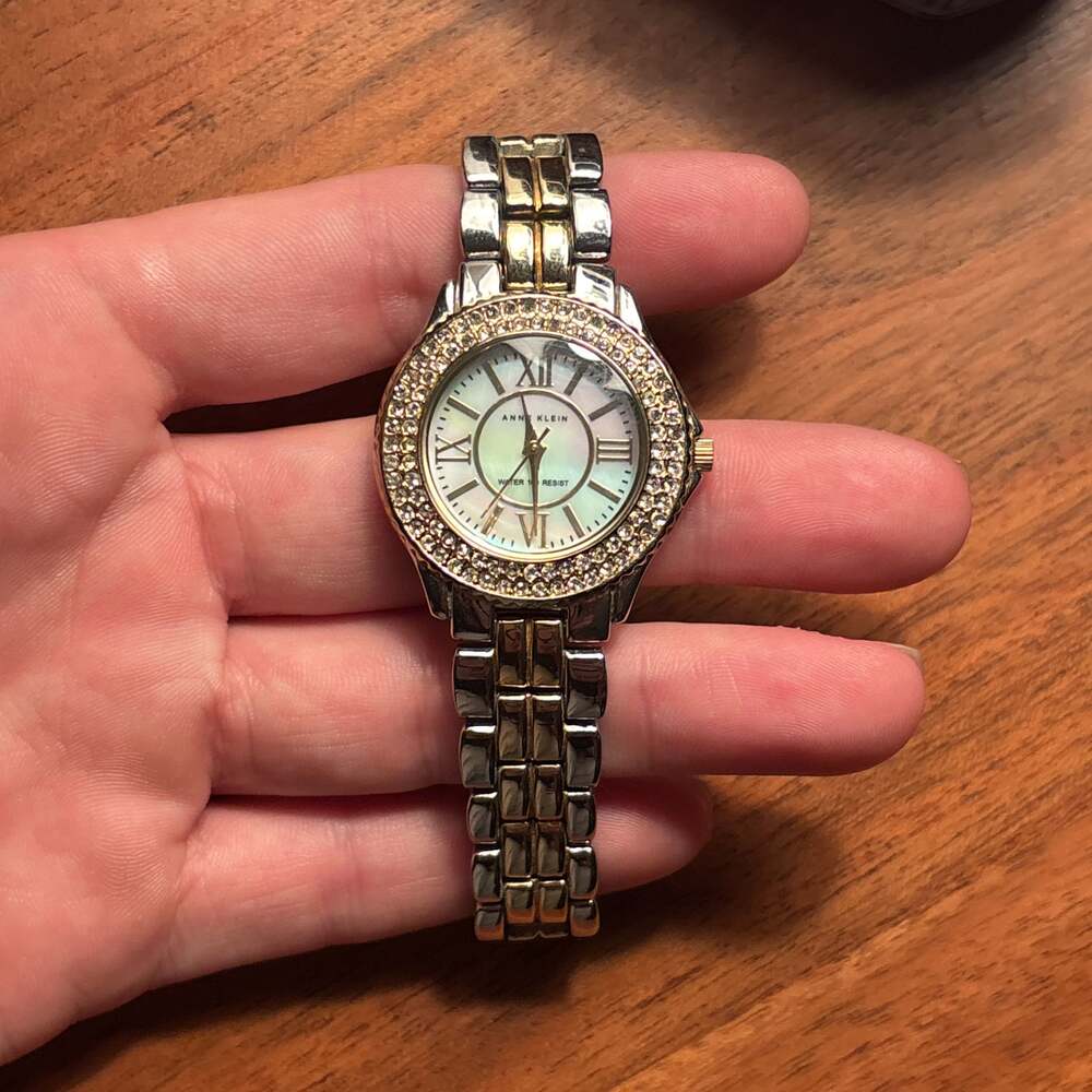 Anne Klein Women's 10/9537MPTTT Mother of Pearl Dial Silver/Gold Tone Band Watch